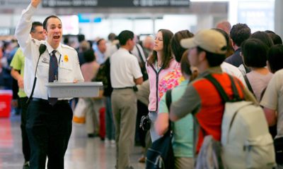 Photo of TSA agents and crowd