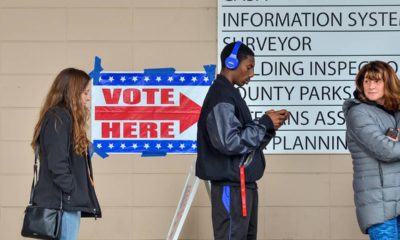 Photo of voters waiting in line to vote in the 2018 Midterm Election