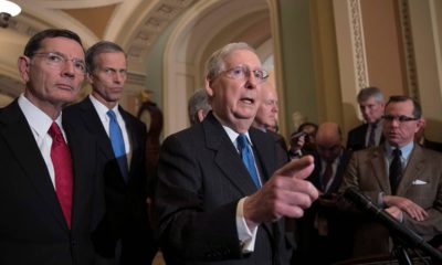 Photo of Senate Majority Leader Mitch McConnell, R-Ky., joined from left by Sen. John Barrasso, R-Wyo., and Sen. John Thune, R-S.D.