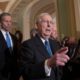 Photo of Senate Majority Leader Mitch McConnell, R-Ky., joined from left by Sen. John Barrasso, R-Wyo., and Sen. John Thune, R-S.D.