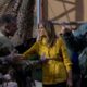Photo of President Donald Trump and Melania Trump getting US troops in Iraq