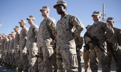Photo of U.S. Marines standing guard