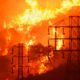 Photo of flames burning near power lines in Sycamore Canyon