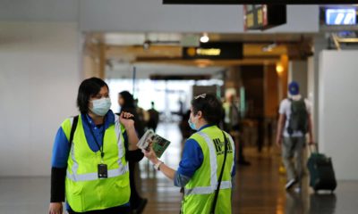 Photo of airport workers waring masks in Washington